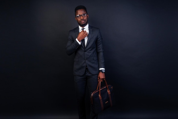 handsome black successful rich american businessman dark suit studio fashion shot isolated black background 175356 1995 handsome black successful rich american businessman dark suit studio fashion shot isolated black background 175356 1995